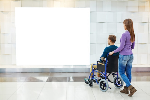 Free Photo disabled contemplating in mall