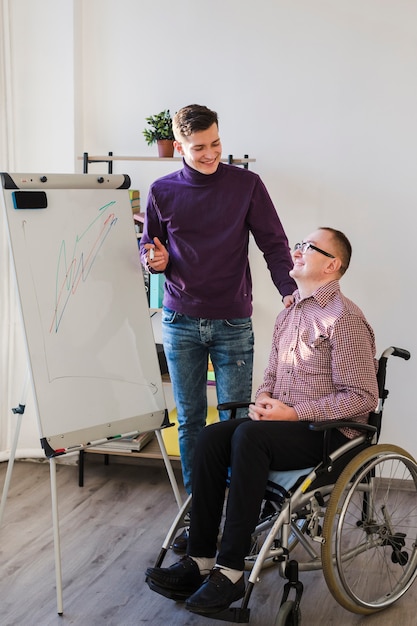 Disabled man working at the office