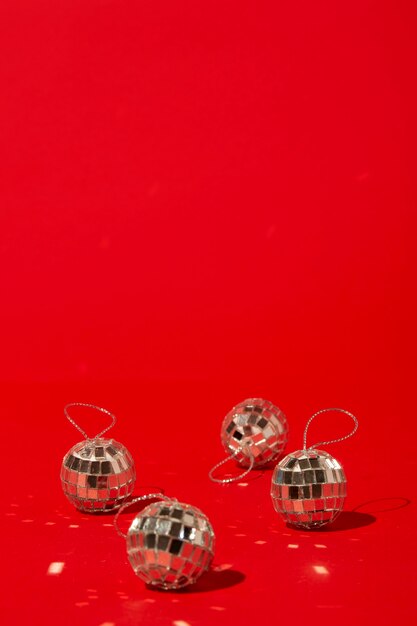 Disco balls on red table