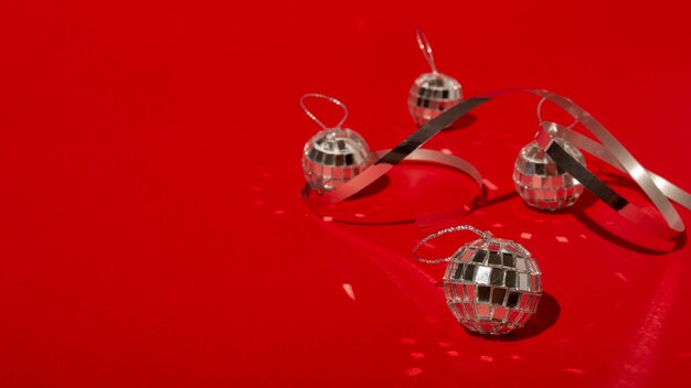 Disco balls on red table