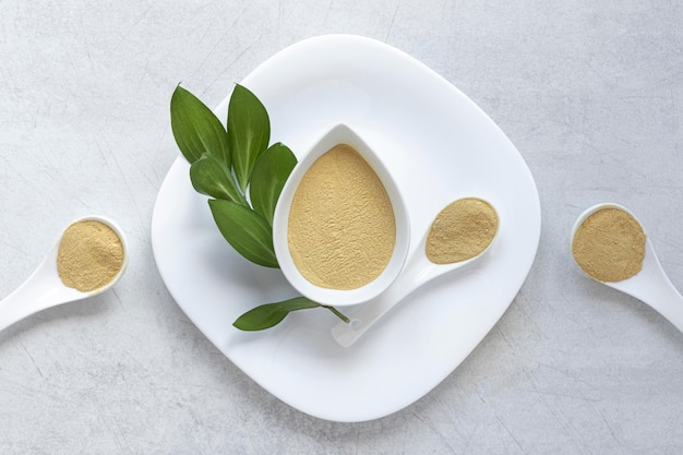 Dishes with sand and leaves