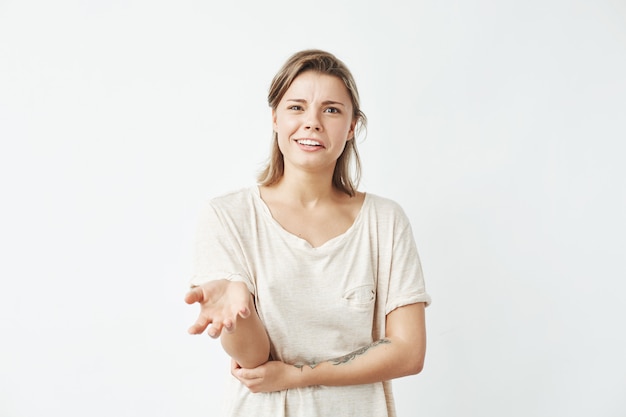 Displeased young girl gesturing speaking .