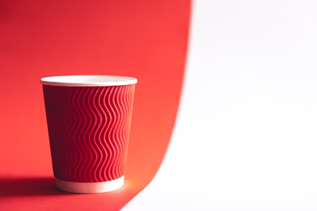 Free Photo disposable paper cup in trendy color viva magenta