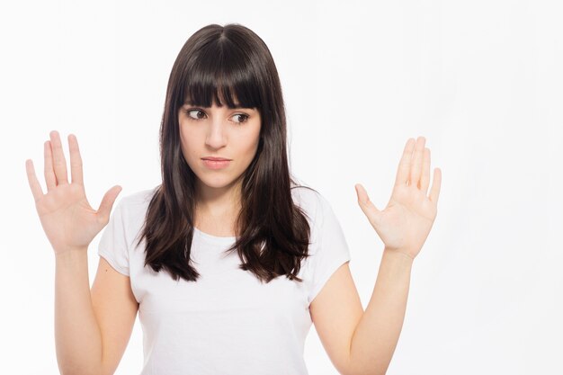 Dissatisfied woman gesturing with hands