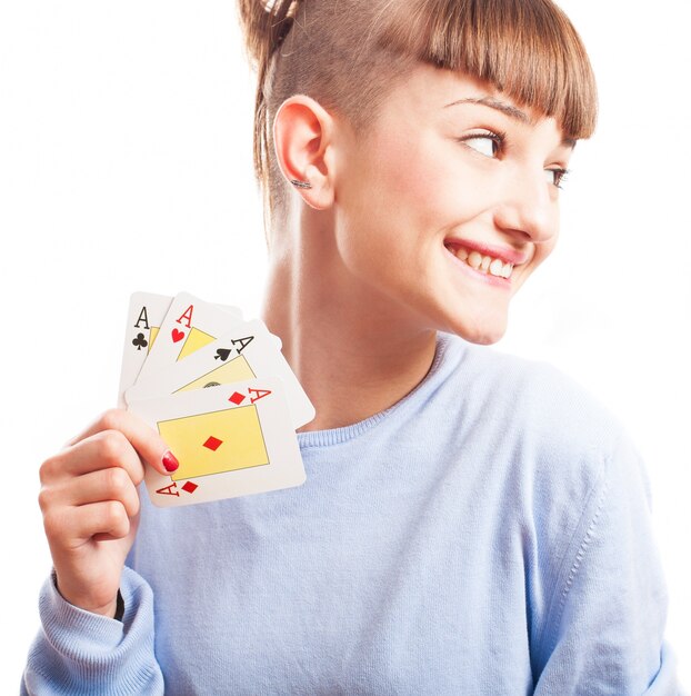 Distracted girl showing her cards