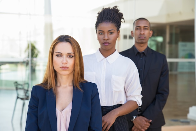 Free Photo diverse business colleagues posing in office