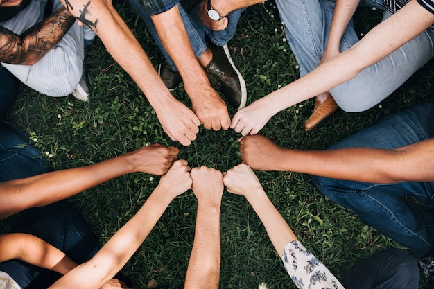 Free photo diverse community with hands in a circle