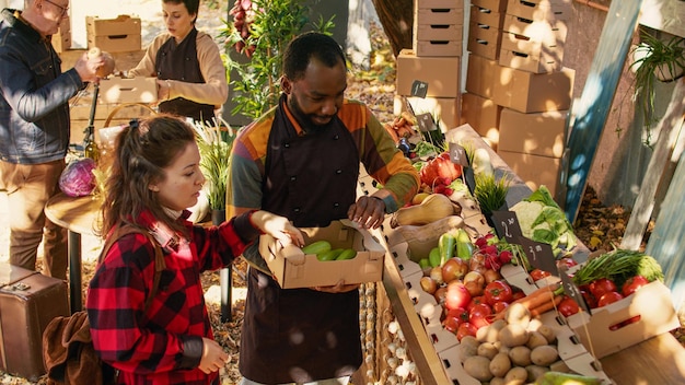 Free photo diverse local vendors preparing healthy market counter