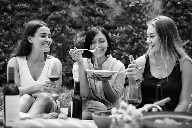 Free photo diverse people enjoying food togethr