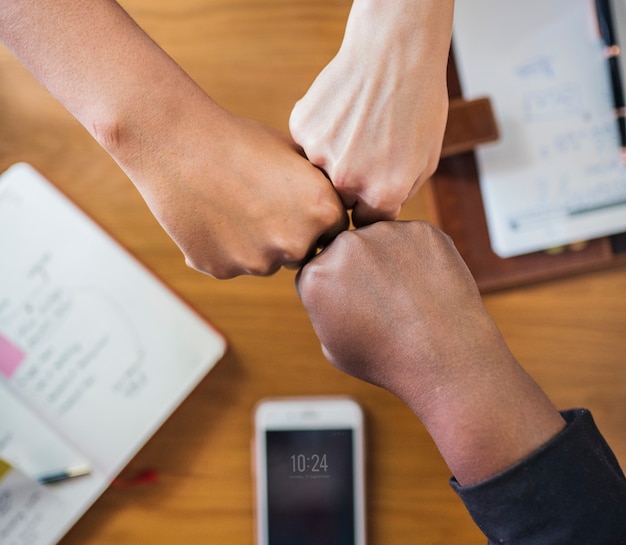 Free Photo diverse people giving a fist bump