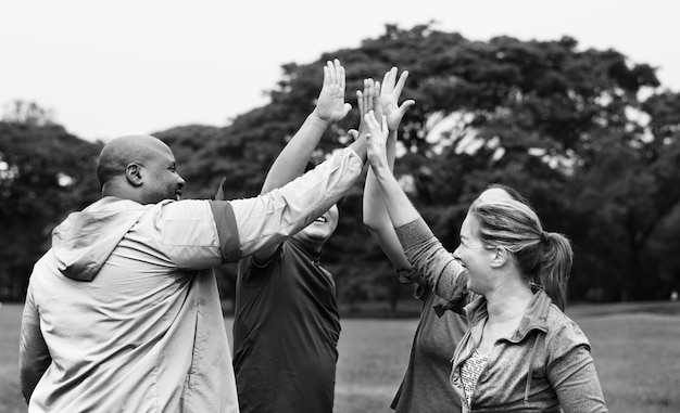 Free Photo diverse people making a high five