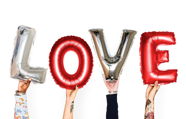 Free Photo diversity hands holding love balloon