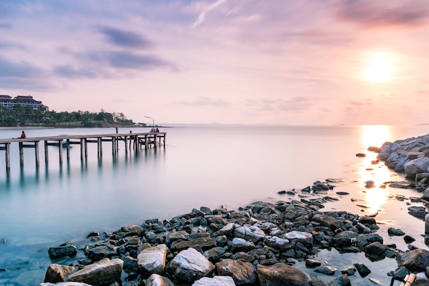 Free photo dock and pier at sea in twilight long exposure