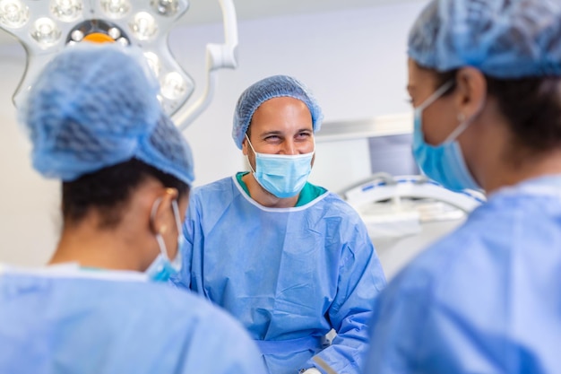 Doctor and assistant nurse operating for help patient from dangerous emergency case Surgical instruments on the sterile table in the emergency operation room in the hospitalHealth care and Medical