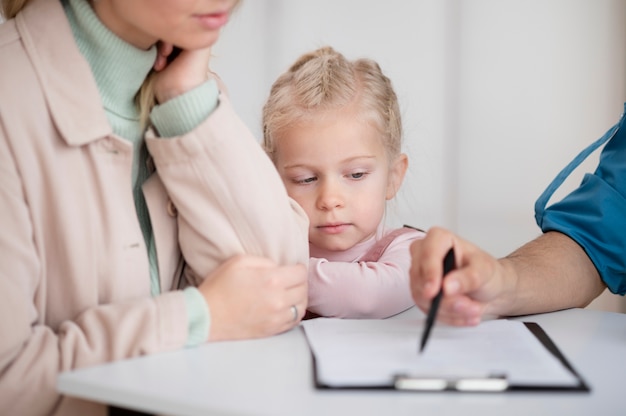 Doctor doing their work in pediatrics office