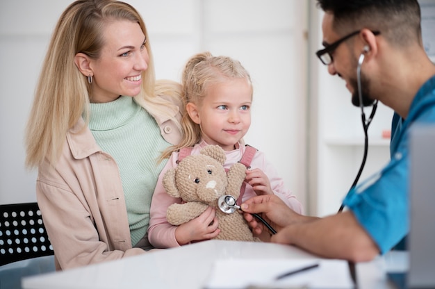 Doctor doing their work in pediatrics office