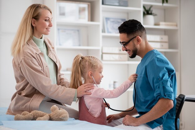 Doctor doing their work in pediatrics office