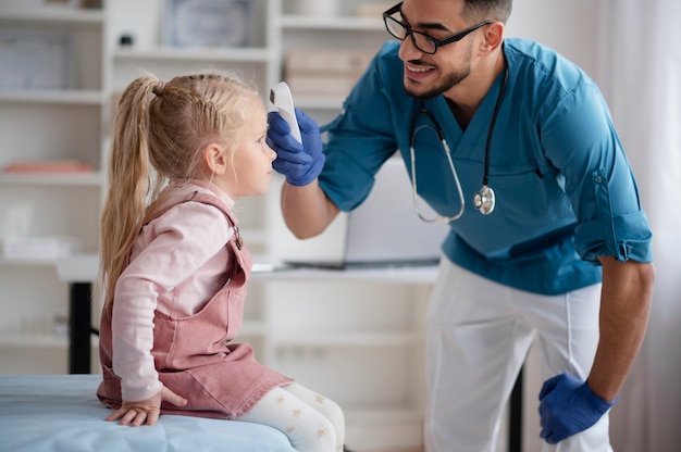 Doctor doing their work in pediatrics office