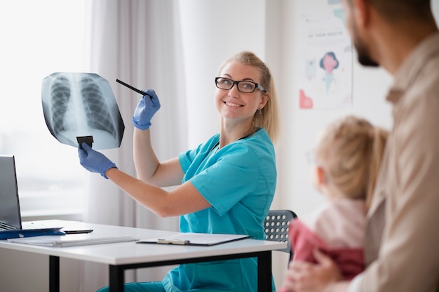 Doctor doing their work in pediatrics office