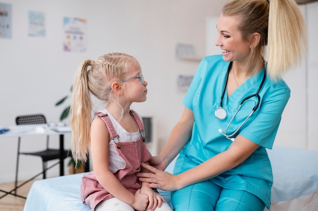 Doctor doing their work in pediatrics office