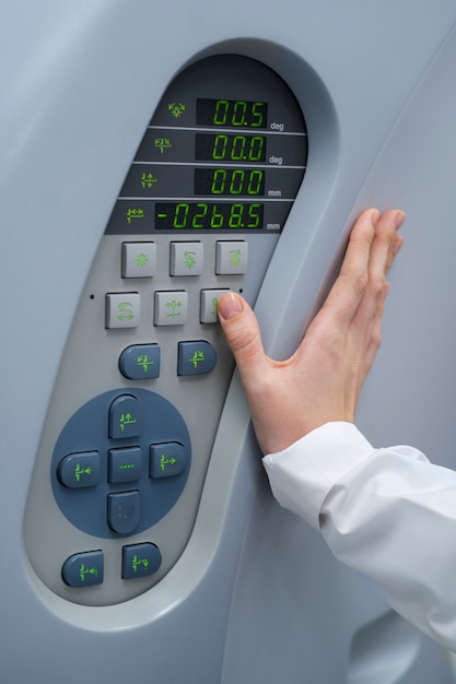 Free photo doctor getting ct scan machine ready for use