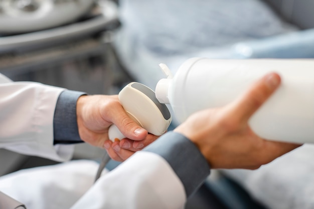 Free Photo doctor hands preparing a medical device to use