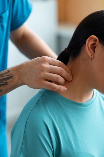 Free Photo doctor helping patient during rehabilitation