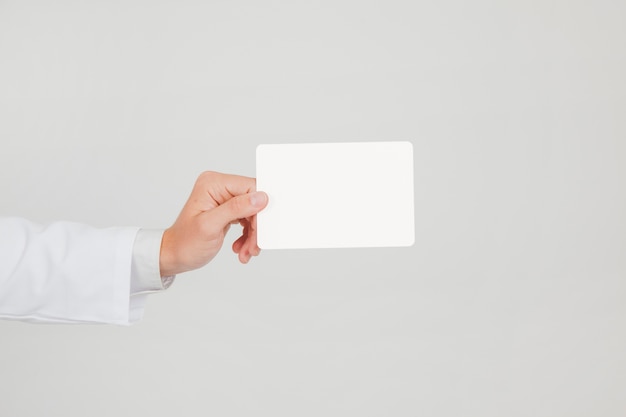 Doctor holding paper with hand