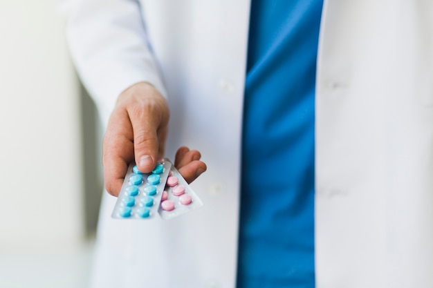 Free Photo doctor holding pills