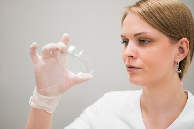 Doctor looking at sample