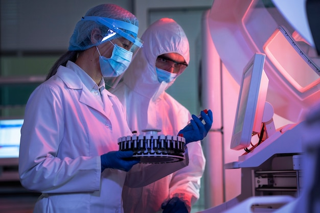 Free photo doctor performing medical research in lab