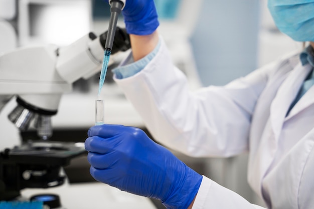 Free photo doctor performing medical research in lab