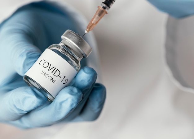 Doctor preparing a covid-19 vaccine