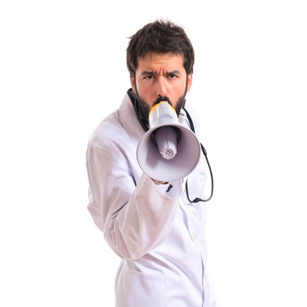 Doctor shouting over isolated white background