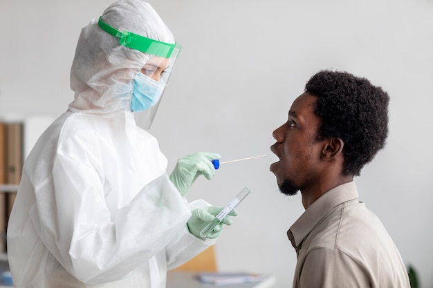 Doctor taking coronavirus test sample