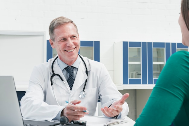 Free Photo doctor tending to a patient