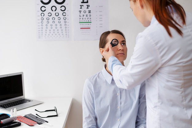 Doctor testing patient eyesight