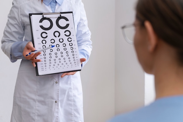 Doctor testing patient eyesight