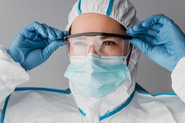 Doctor wearing a face mask at work