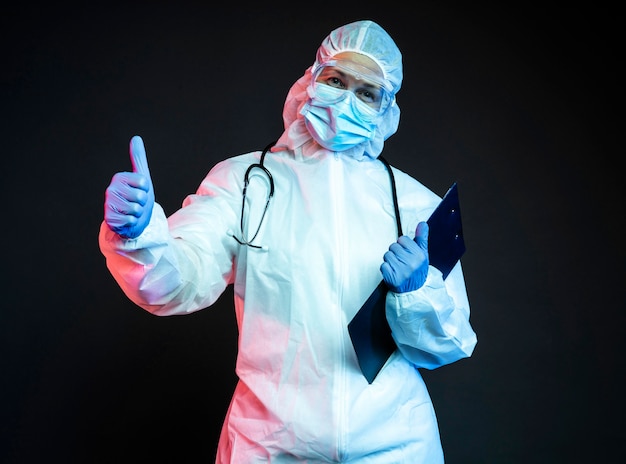 Free photo doctor wearing pandemic medical equipment