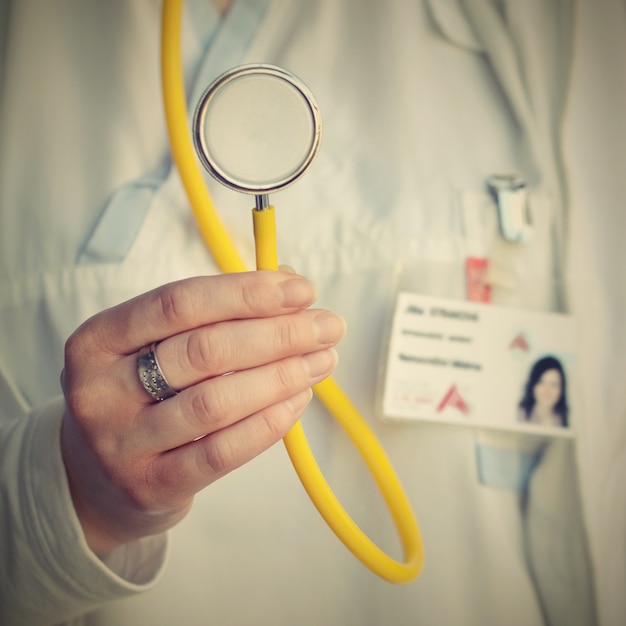 "Doctor with yellow stethoscope"