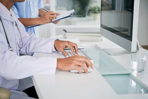 Doctor working on computer