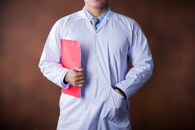 doctor working holding a clipboard