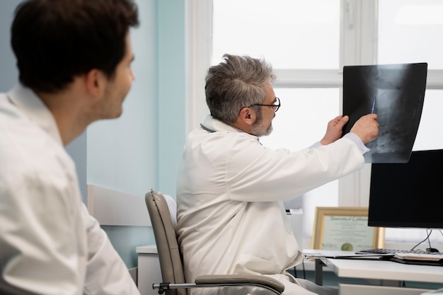 Doctors checking patient's radiography together