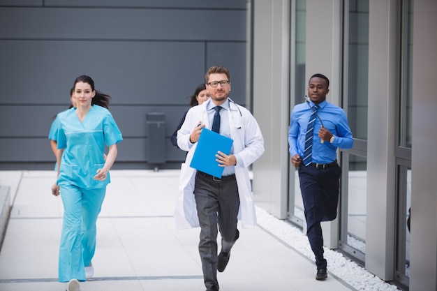 Free Photo doctors and nurses rushing for emergency