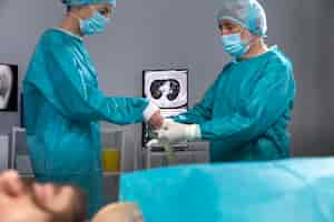 Free photo doctors preparing for a surgical procedure