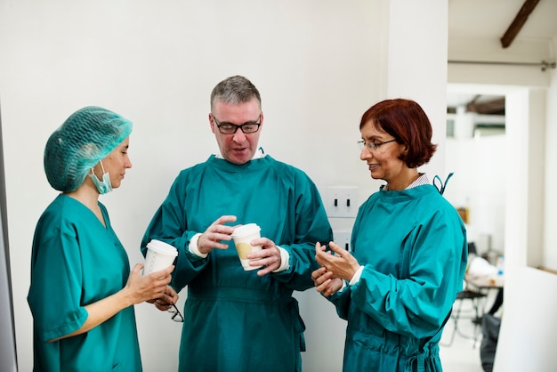 Free photo doctors talking together during break time