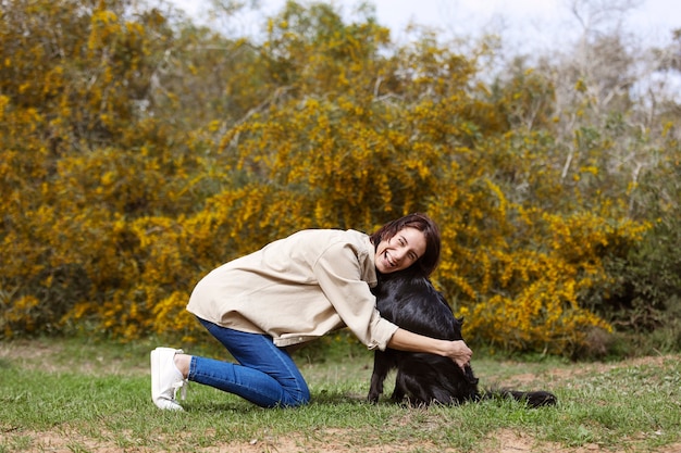 Dog trainer interacting with their pet