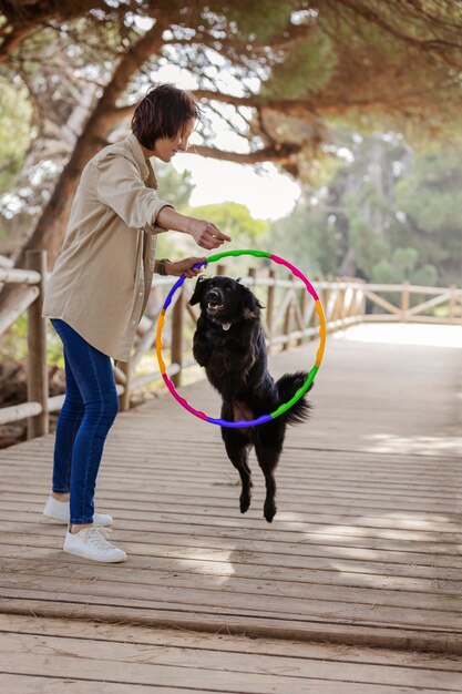 Dog trainer interacting with their pet