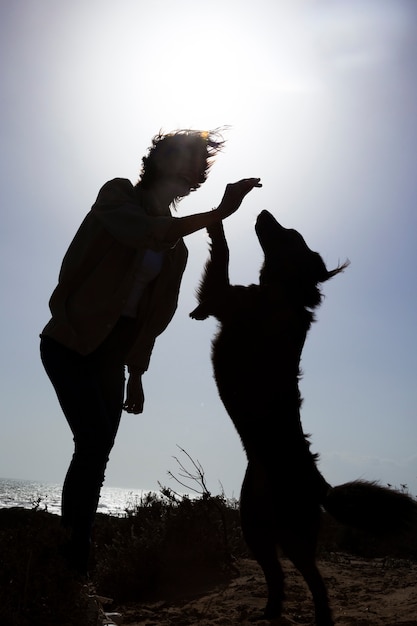 Dog trainer interacting with their pet